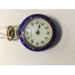 A blue guilloche enamel ladies fob watch with pictorial scene to the reverse, in gilt metal,