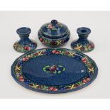 A Minton rotique pattern dressing table set including a pair of candlesticks,