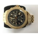 A gilt metal Eligio chronograph wristwatch with a black dial, approx diameter 45mm,