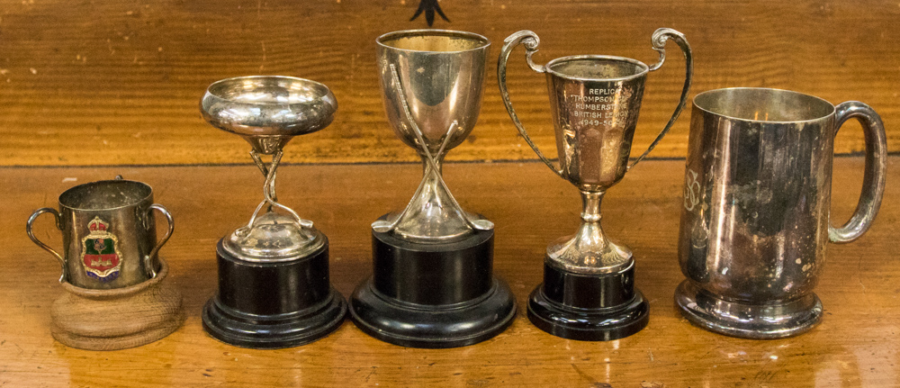 A collection of trophies and bases, including a silver Birmingham 1931, 40.