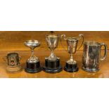 A collection of trophies and bases, including a silver Birmingham 1931, 40.