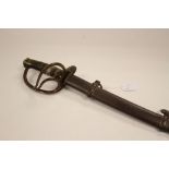 US 1860 pattern Sabre. Brass guard with wire bound leather grip.