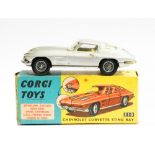 Corgi: A boxed Chevrolet Corvette Sting Ray, 310, metallic silver, lemon interior,