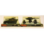 Dinky: A cased Tank Destroyer, '694', and a cased 88mm Gun, '656', one case as found.