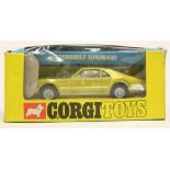 Corgi: A boxed Oldsmobile Toronado, 276, metallic green body, cream interior, original carded box,
