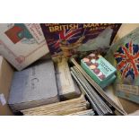 A box of cigarette cards and albums including Ogdens, Wills, Players, etc, dating from circa 1940s,