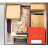 A box of assorted coins including six various Royal Commemorative Crowns with boxes, Proof sets,