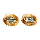 **REOFFER IN JANUARY A&C £200-£300** A pair of aquamarine single stone 14ct gold clip earrings,