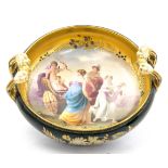 A Vienna porcelain twin handled bowl, squat form with Bacchus head handles,