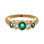 **REOFFER IN JANUARY A&C £800-£1200** An emerald and diamond five stone 18ct yellow gold ring,