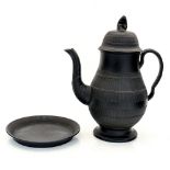 A black basalt coffee pot and stand, baluster form,