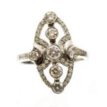 **REOFFER IN A&C £500-£700** An Art Deco style ring, set with seven round brilliant cut diamonds,