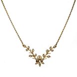 A late Victorian/Edwardian seed pearl set yellow gold pendant necklace,