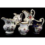 A collection of Staffordshire jugs, floral decorated baluster form, circa 1830,