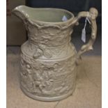 A Mason's Patent Ironstone buff moulded stoneware pitcher, a hunting scene with stags to the frieze,