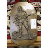 A bronze plaque of A Gentleman in Khaki, a trench art shell case,