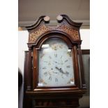 A George III oak and mahogany cross-banded longcase clock,