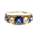 An Edwardian sapphire and diamond five stone boat head 18ct gold ring,