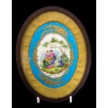 A Sevres type porcelain plaque, the oval courting scene,