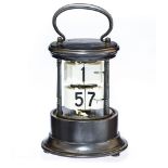 An early 20th Century 'digital' desk timepiece in the manner of Junghans,