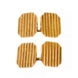 A pair of Tiffany & Co 14ct yellow gold chain cufflinks, fluted hexagonal plates,