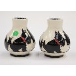 Two miniature Moorcroft first quality vases in the 'Canine Companions' pattern,