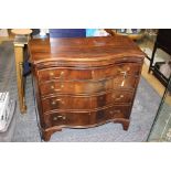 late Victorian mahogany serpentine fronted chest of drawers, in the George III style,