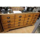 Large oak, shop counter display unit with graduated wooden drawers, inside a glass cabinet,