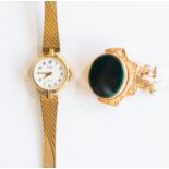 A ladies limit bracelet watch and a 9ct gold hardstone fob seal, Bloodstone and carnelion.