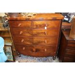 A George III bow fronted mahogany chest of drawers,