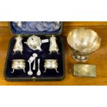 An Edwardian VII silver five piece cruet with three cruet spoons, baluster form with wavy edges,