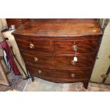 A George III mahogany chest of drawers, of bow fronted form,