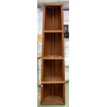 A boat shaped four shelf shelving unit