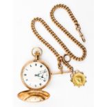 A gold pocket watch,