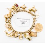 A 9ct gold charm bracelet, with various charms such as a snail, an owl and a duck,