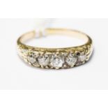 A five stone boat head diamond unmarked yellow gold ring,