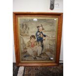 Tapestry depicting two boys by a river, one holding a monkey, in birds-eye maple veneer frame.
