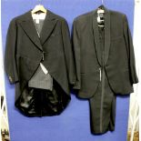 A collection of dinner suits and or jacket to include a large dinner jacket with wide satin revers,