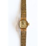 A 9ct gold ladies watch, Rotary, bark effect strap, 15.