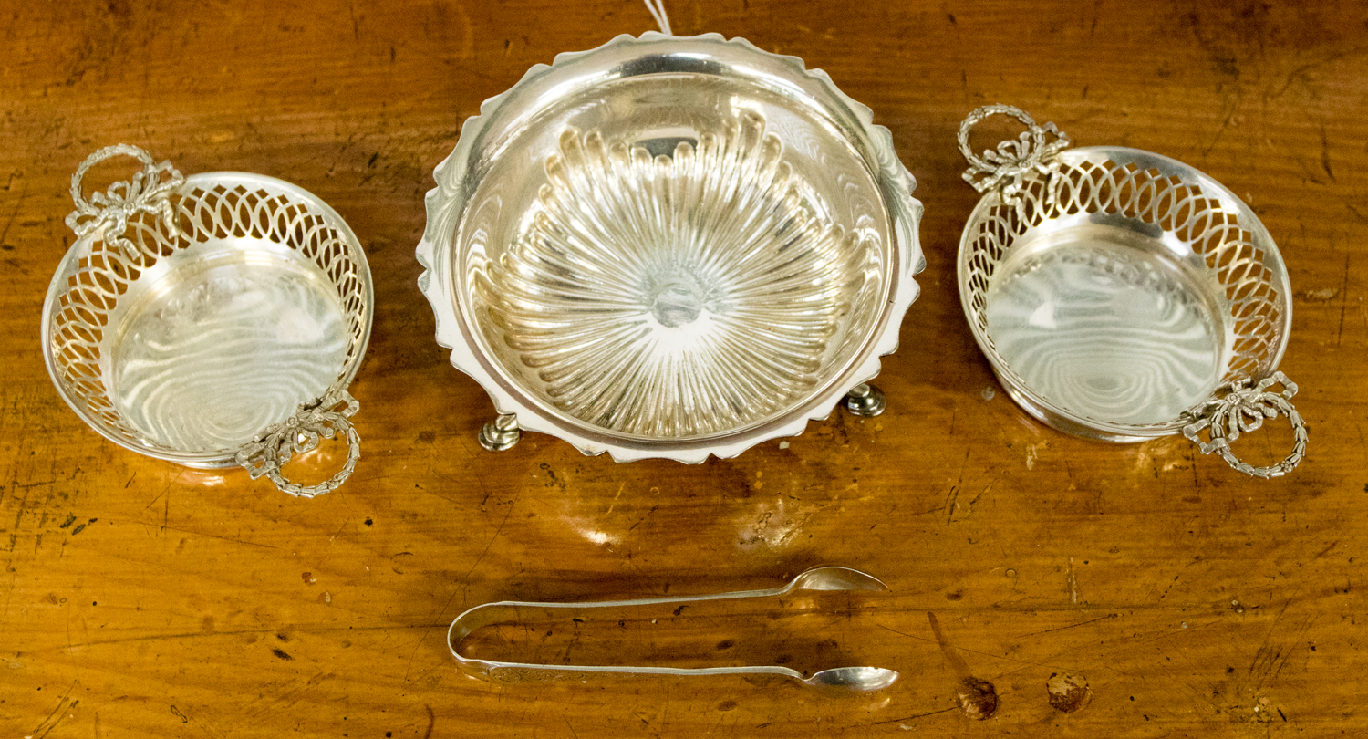 A pair of silver pierced twin handled dishes, weighing approx 3.