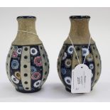 A pair of Amphora Earthenware squat vases,