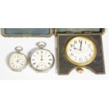 A silver pocket watch,