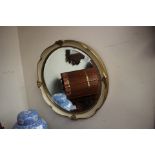 A 20th Century circular gilt framed mirror,