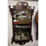 A George III style mahogany fretwork mirror