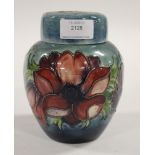 A Moorcroft ginger jar, anemone pattern, blue ground, initialled WM to base in green,