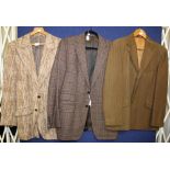 A brown check man's jacket with a grey check jacket by Jerom (1980s) together with a sage jacket