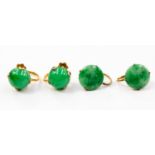 Two pairs of jadeite earrings, set in 14ct gold with screw earring fittings,