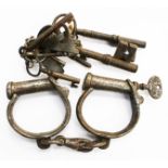 A set of metal handcuffs,