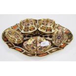 A Royal Crown Derby, six piece dressing table trinket set, in the 'Imari' pattern, 1128,