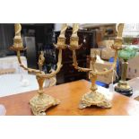 Pair of ormolur two branch foliate candelabra